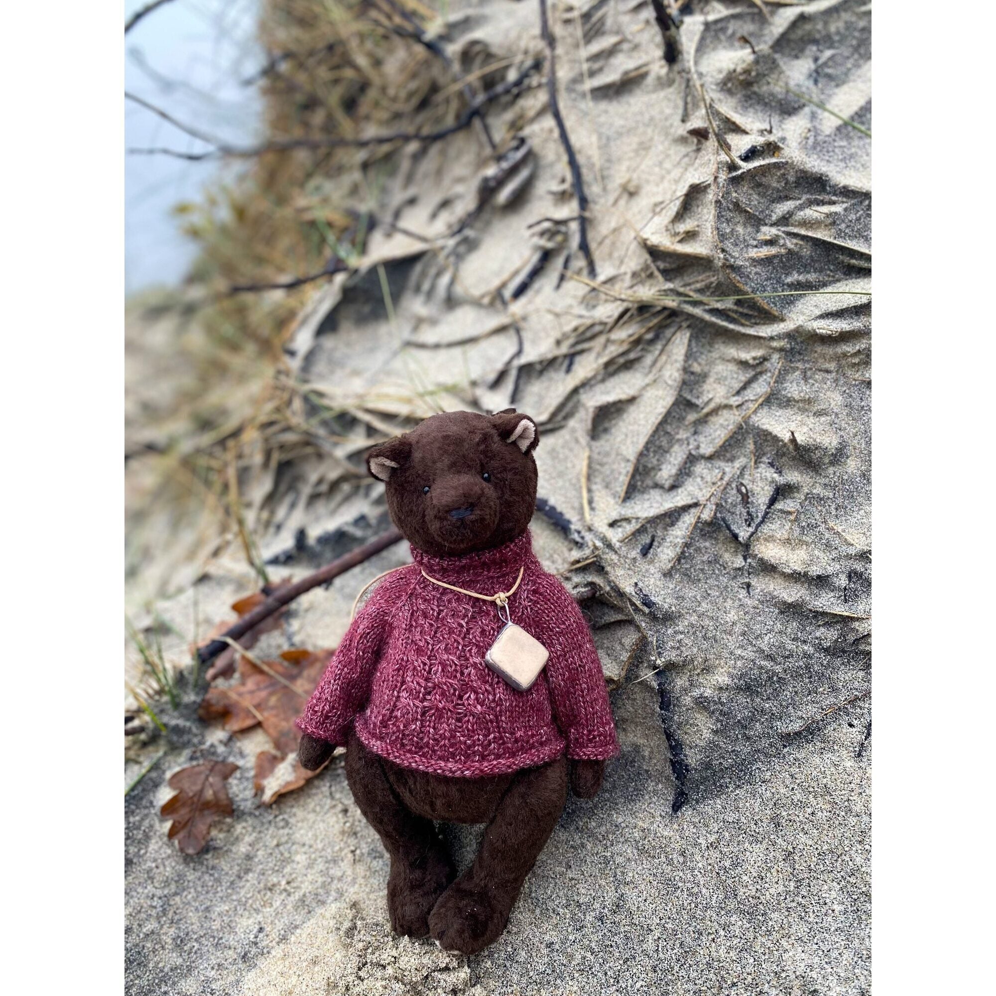 Teddy bear with ceramic pendant