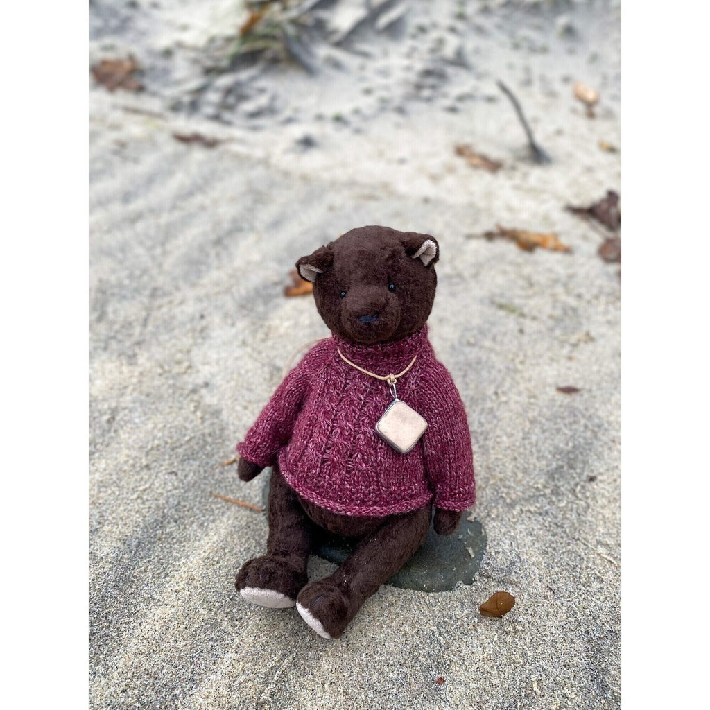 Teddy bear with ceramic pendant