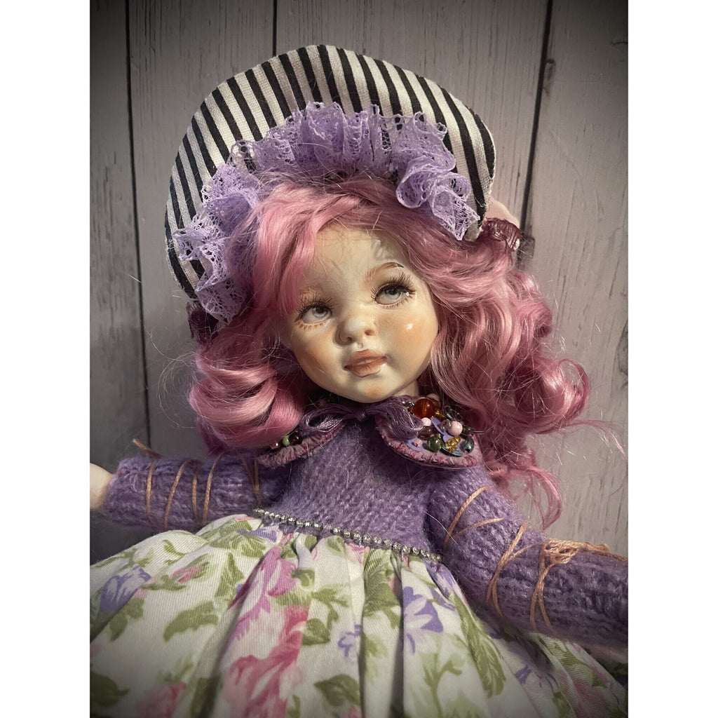 Collectible porcelain doll "Mona".