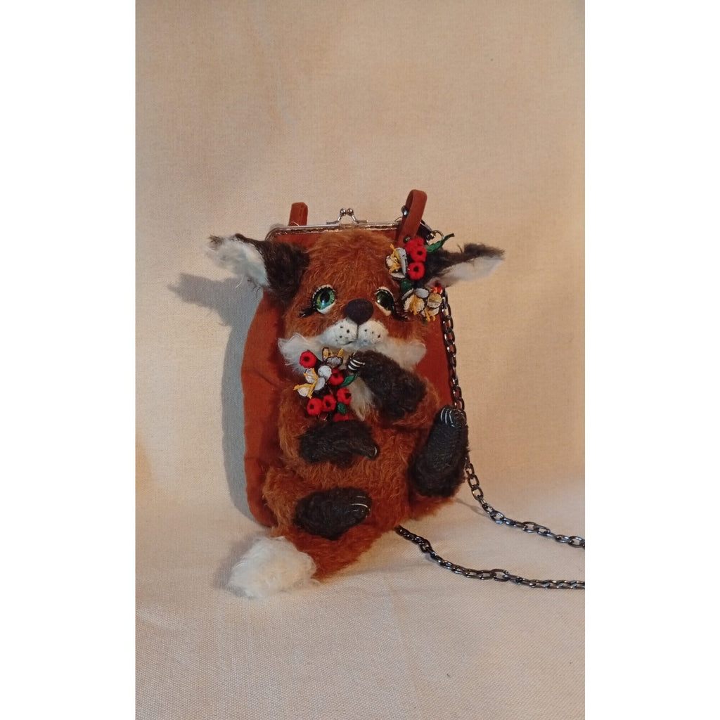 The fox bag,a handbag for a phone with mechanical music usin