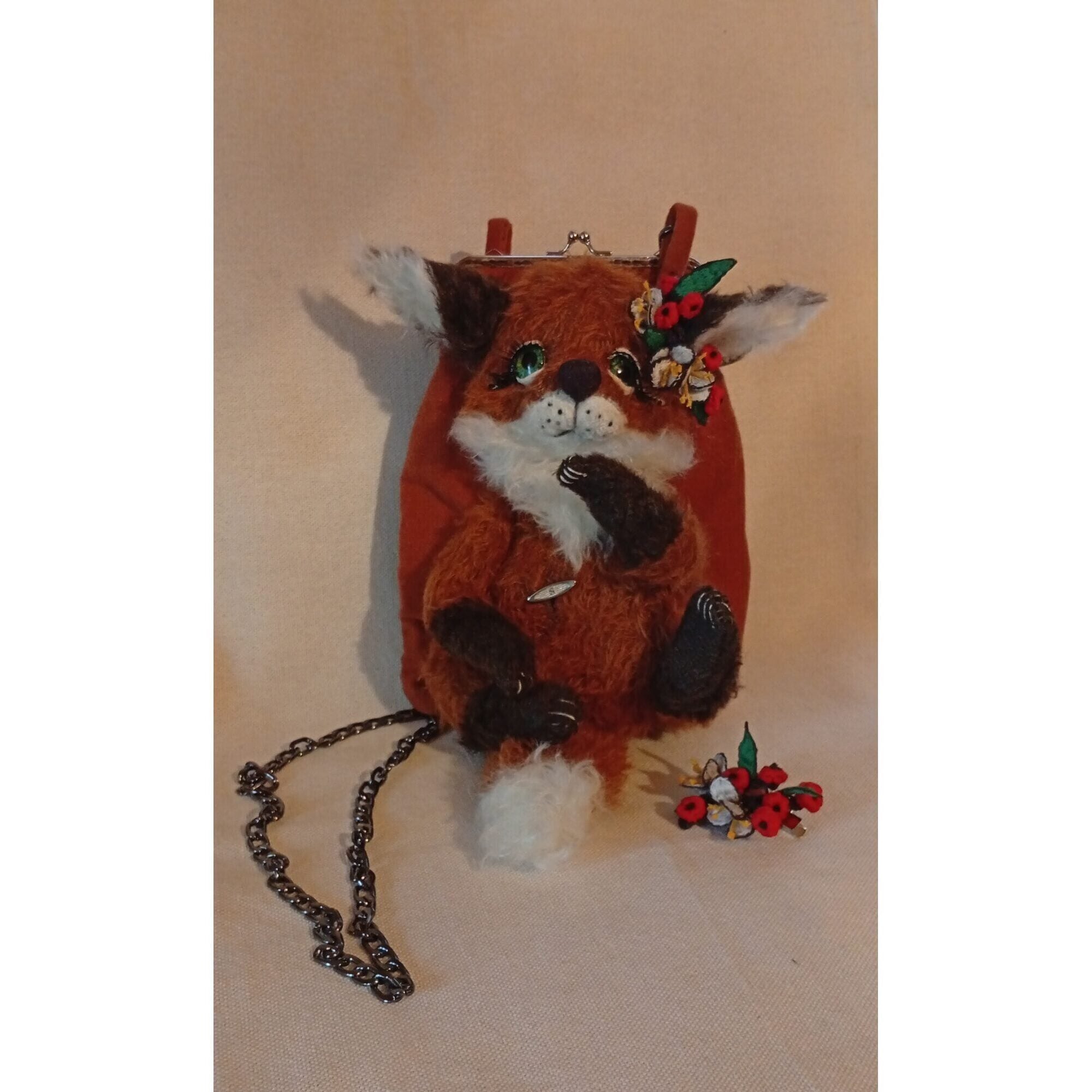 The fox bag,a handbag for a phone with mechanical music usin